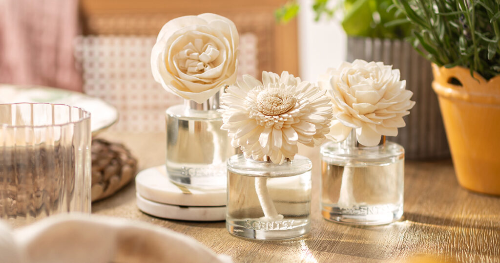 Scentsy Fragrance Flowers displayed on a styled vanity with home decor